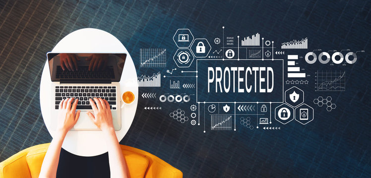 Protected with person using a laptop on a white table