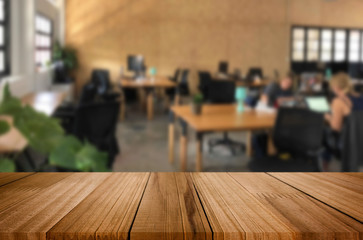 Selected focus empty brown wooden table in office with big windows of the Background with bokeh image. for your photomontage or product display