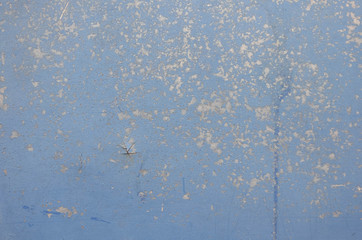 Multicolored background,Rusty metal with blue paint flaking and cracking texture