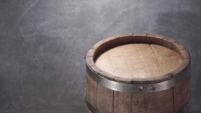 Background of barel on a wooden table, rotation 360 degrees. Beautiful dark background.	