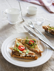 Toasted English bacon & egg a white background