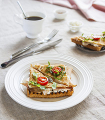 Toasted English bacon & egg a white background