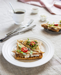 Toasted English bacon & egg a white background