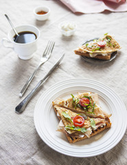 Toasted English bacon & egg a white background