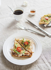 Toasted English bacon & egg a white background