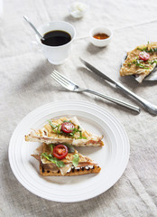 Toasted English bacon & egg a white background