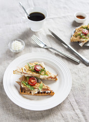 Toasted English bacon & egg a white background