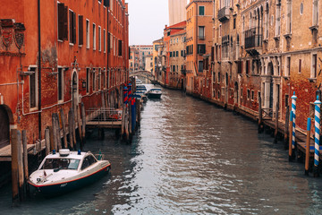 Fototapeta na wymiar The street with a boat in Venice, Italy.