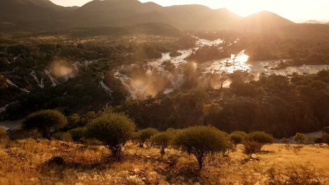 Sunrise in waterfall Epupa Falls, Northern Namibia