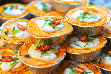 Thai steamed curried fish (Hor Mok Pla), is a Thai traditional food that cooked by steaming. Fish meat is the main ingredient. Mix with spice and knead together. Thai traditional food style.