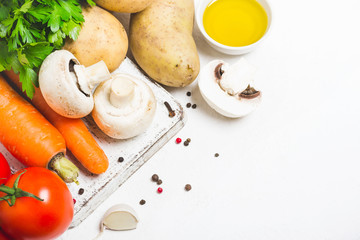 Food cooking background. Fresh vegetables, spices and mushrooms on  white background