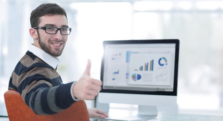 businessman analyzing marketing graphics