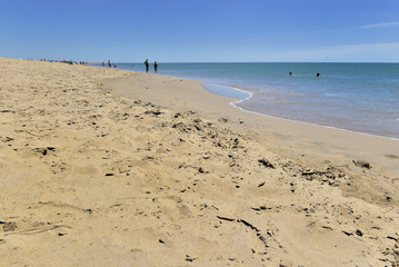 beach in resort with people far of  in Vendée - France
