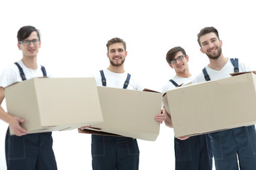 photo workers holding boxes when moving flats,