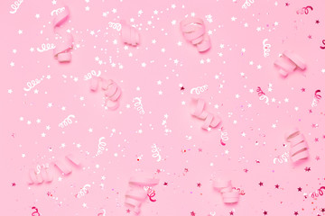 Pink festive confetti background.
