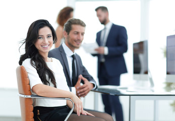 couple of colleagues sitting at a Desk