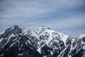 Fototapeta na wymiar snowy mountain view, TATEYAMA KUROBE Alpine route