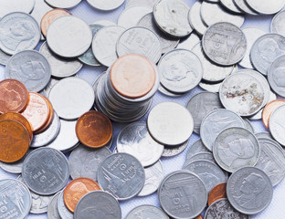 Financial concept: a pile of coins made of gold and silver