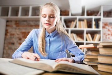 Teenage girl in a library