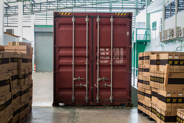 The container inside warehouse on shipment area.