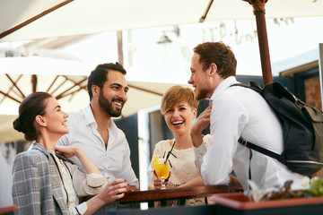 Friends Having Fun, Drinking In Bar Outdoors
