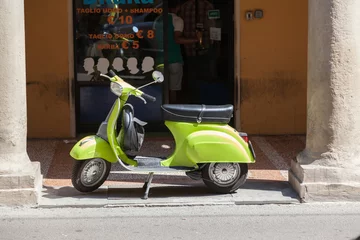 Schilderijen op glas Bologna ITALY July 2018 - vespa special - old italian vintage scooter in front a hair style shop - italian style © Alessandro