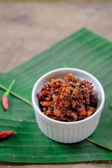 Thai chili paste on banana leaf background