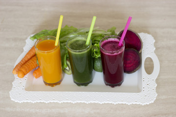 Fototapeta premium Vegetable smoothies detox - Carrot, beet and green salad.
