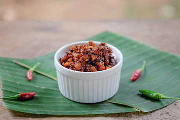 Thai chili paste on banana leaf background