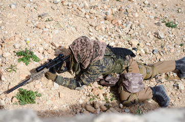 Sniper aim targe tcamouflage uniform high angle