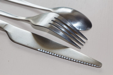 Fourchette, petite cuillère et couteau