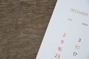 calendar page on wood texture.