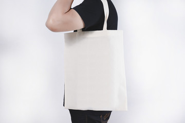 man with cotton bag shopping bags eco mockup