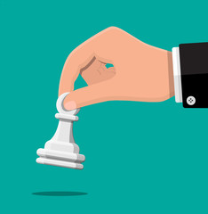 Businessman holding in hand pwan chess figure.