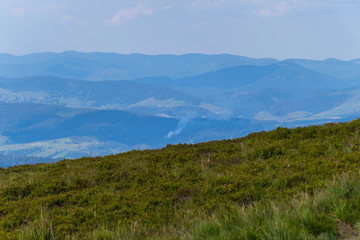 Fototapeta na wymiar glade on the peak of the mountain. a great place to relax