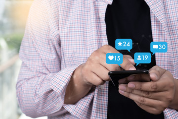 Young man using smart phone Social media and social network Marketing  concept People Connection