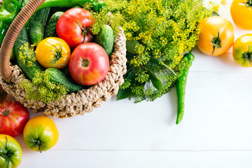 Vegetables In Basket On The White Background Yellow Tomatoes Pepper Cucumbers Dill