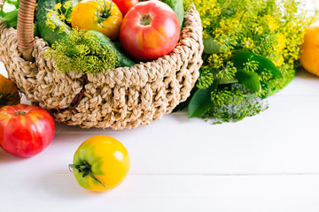 Vegetables In Basket On The White Background Yellow Tomatoes Pepper Cucumbers Dill