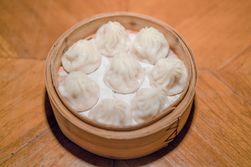 Obraz na płótnie Canvas dumplings inside of bamboo steamer