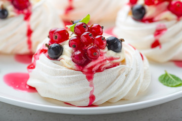 Pavlova meringue cake with fresh berries.