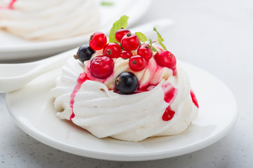 Pavlova meringue cake with fresh berries.