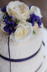Obraz na płótnie Canvas Detail of a multi tiered wedding cake