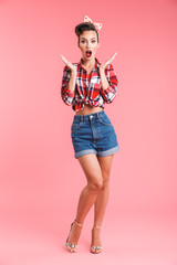 Pretty shocked young pin-up woman