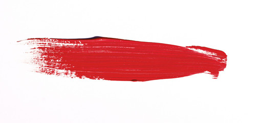 Red brush stroke isolated over white background