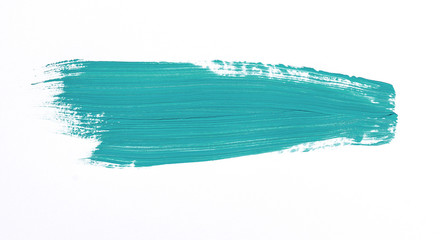 Turquoise brush stroke isolated over white background