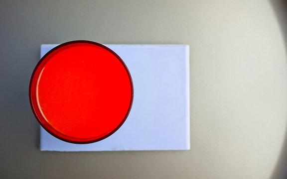 Glass with red liquid