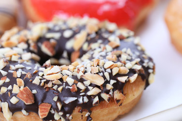 Chocolate almonds Donut isolated on white background