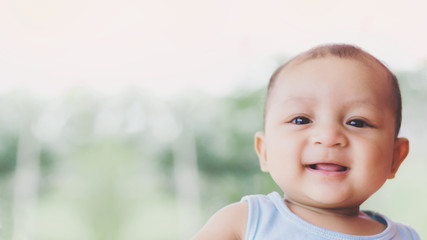 baby smiling , cute asian infant