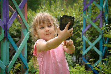 cute girl taking selfie