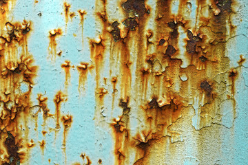 Cracked paint on an  metal surface,  texture of rusty iron